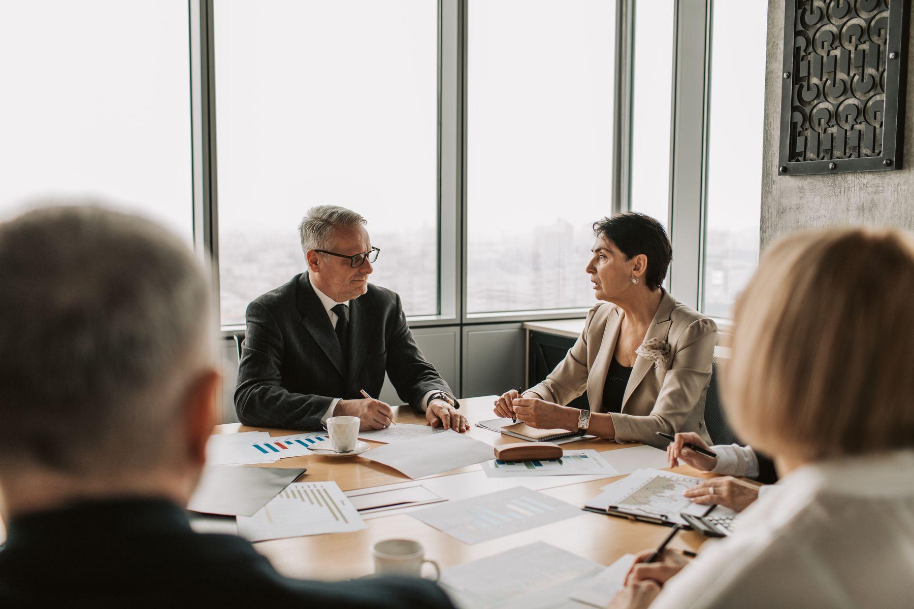 Senior practitioners in a review meeting
